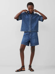 Finley blue denim short sleeve silhouette set in a contemporary box fit complete with collar and concealed button through fastening.
