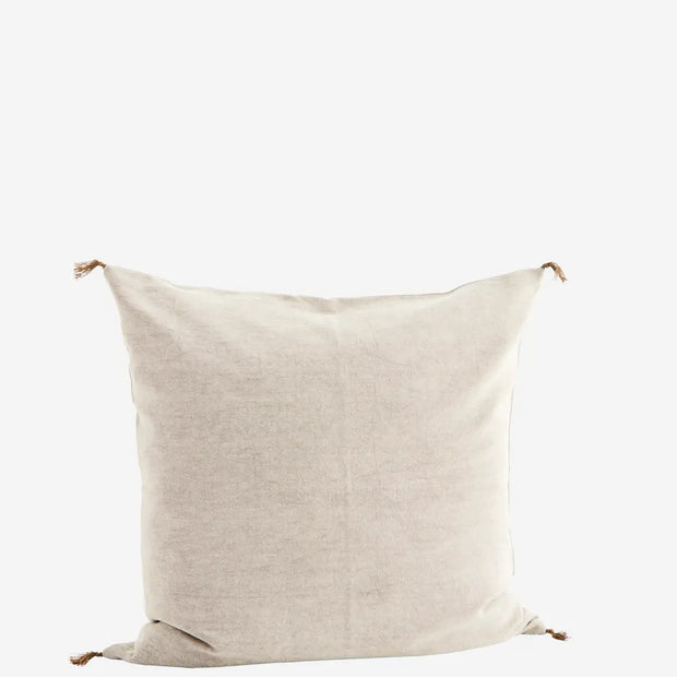50x50 cotton cushion in light taupe, with delicate corner tassels