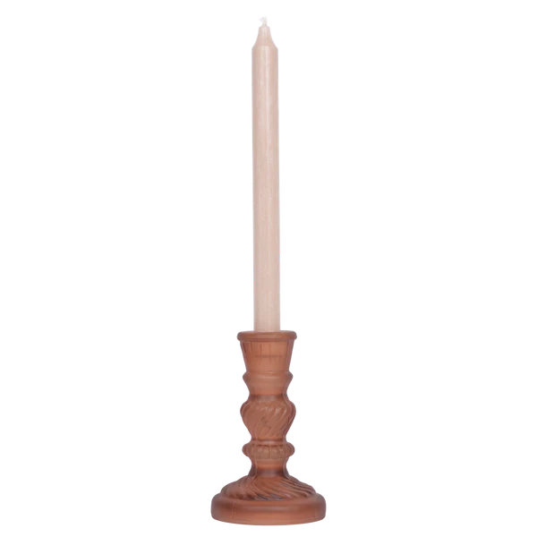 Frosted glass candle holder in terracotta pink.