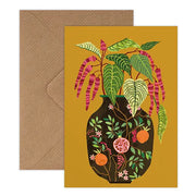 Greeting card with plant illustration on mustard background and brown envelope