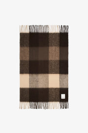 The Reykjavik Throw in Dark Earth Brown. Arctic Fox