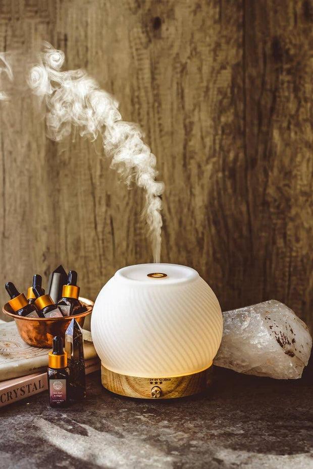 Modern Ultrasonic Mist Diffuser - Textured Glass & Bamboo emitting steam