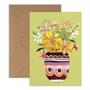 Greeting card with floral design and envelope on a white background