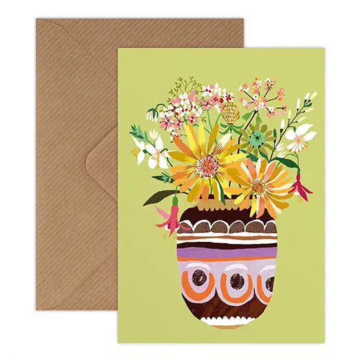 Greeting card with floral design and envelope on a white background