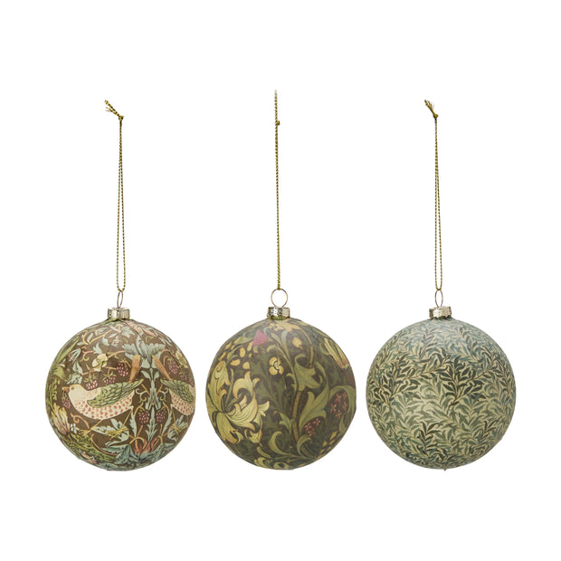 Three decorative Christmas baubles with floral patterns on a white background