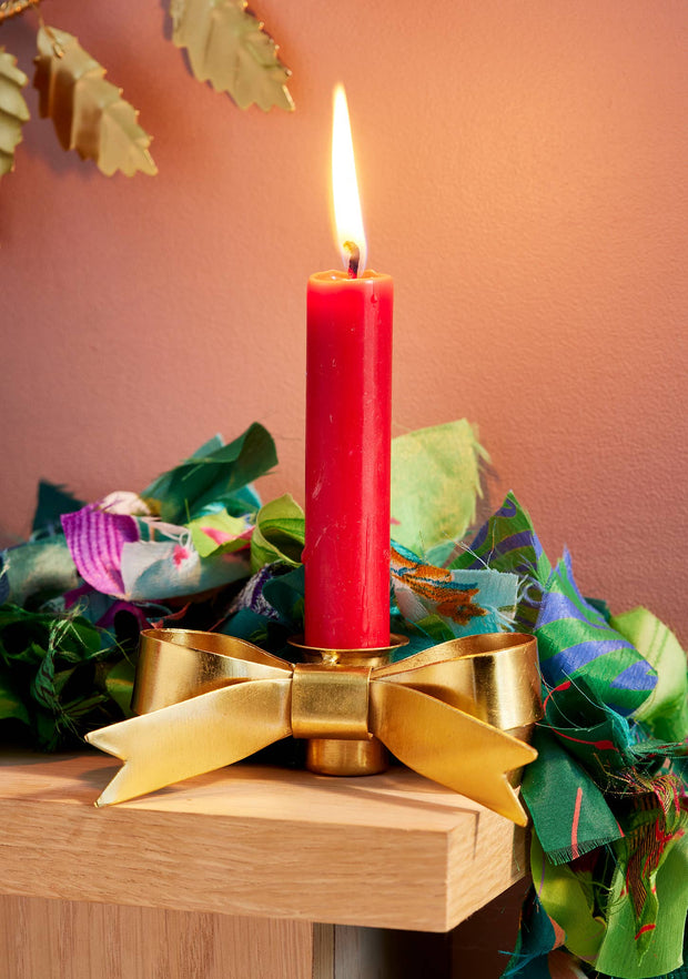 Gold Bow Candle Holder on mantlepiece