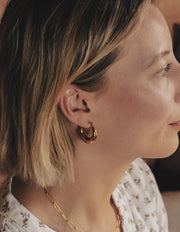 E100 Gold Crescent Hoop Earrings