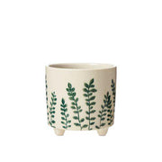 White stoneware pot with green leaf decoartion. 12x11 cm 