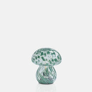 Glass mushroom LED lamp with green speckled pattern on a white background