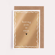 This bold gold love card is a stunning way to say "Loving you is easy", whether as an anniversary card, love card or Friendship card. The versatile love card is blank on the inside, ready for your customers to write a personal message