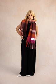 model wearing Stockholm Autumnal Falls Scarf - red & purple check design