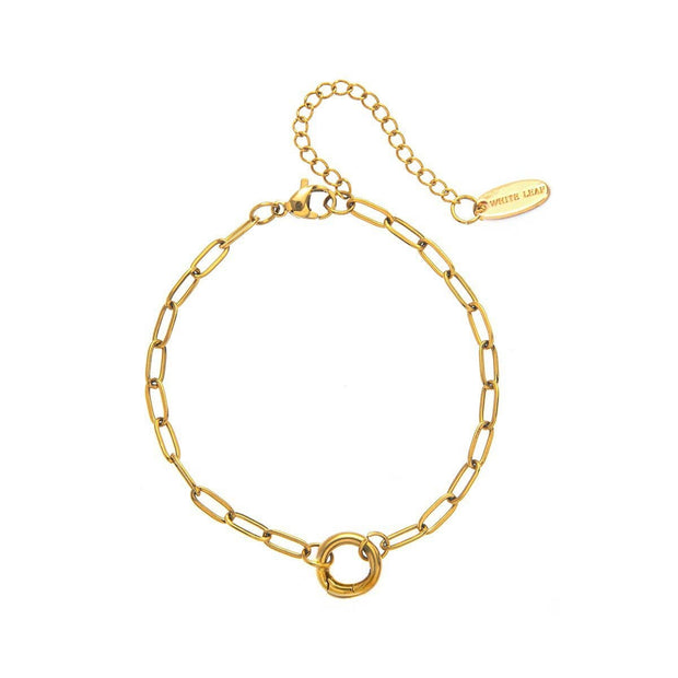 Gold chain bracelet on a white background