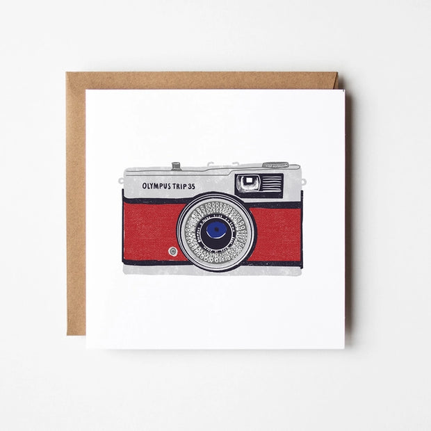 Square greeting card with Camera illustration. Blank inside.