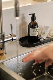 Fig Leaf Amber Hand Wash on kitchen shelf