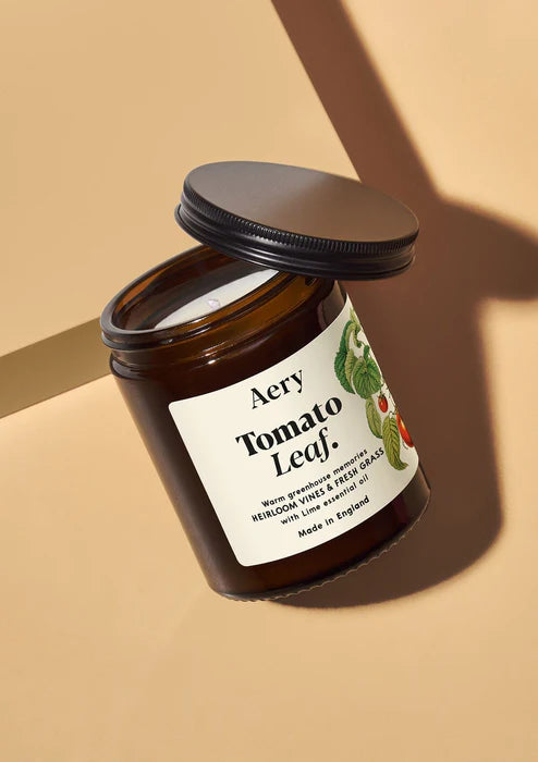 Aery Tomato Leaf Jar candle on a beige background