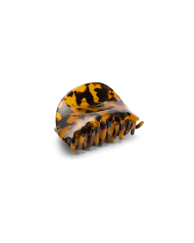 Tortoiseshell hair clip on a white background
