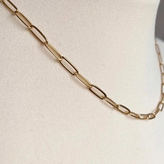 Close up of Little Nell gold plate link chain