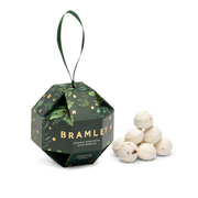 Hexagonal Bramley packaging with rose bath bombs on a white background