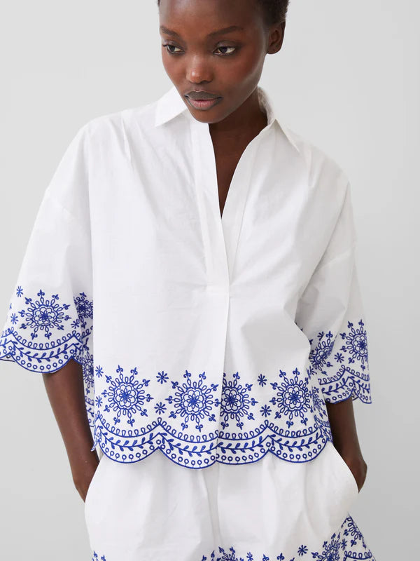 Close up of cotton embroidered blouse from Victoria shop
