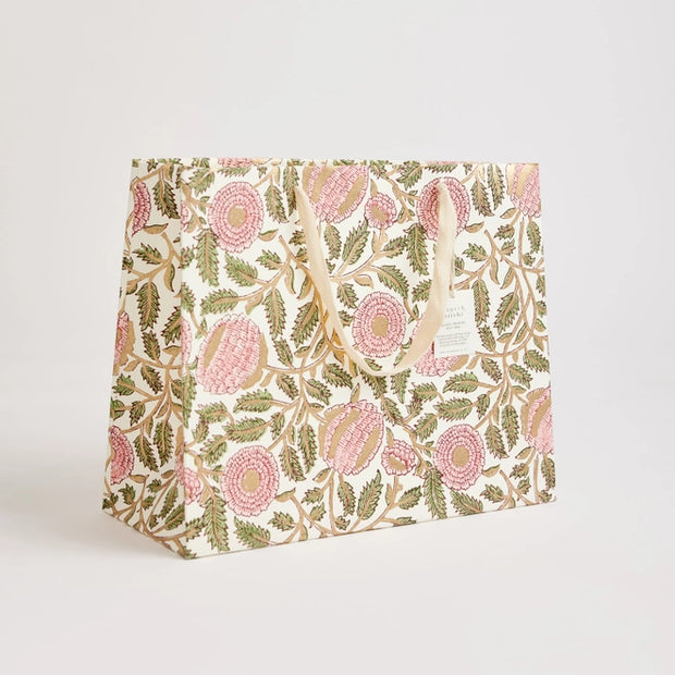 These hand block printed gift bags are made from a strong 250gsm recycled cotton card paper in colours and designs complementing the gift wrap range.