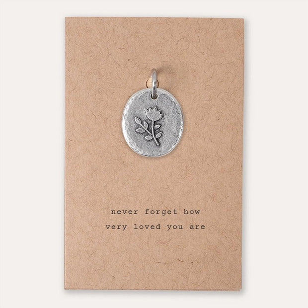 Kutuu charm- "Never forget how very loved you are". 