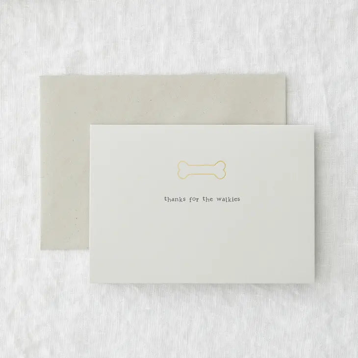 Plain card with gold foil bone, reading "thanks for the walkies"