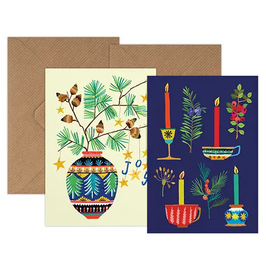 Two Christmas-themed greeting cards with envelopes on a white background
