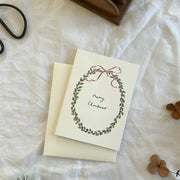 Holly wreath traditional petite christmas card, Annie Brougham