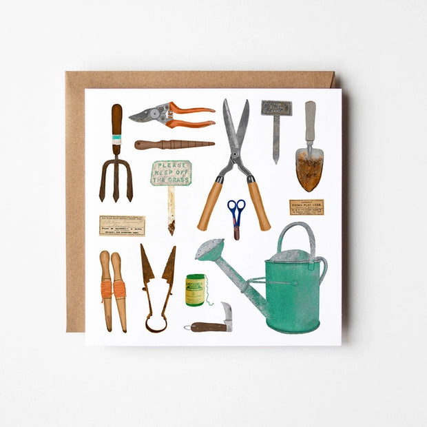 Square card features original 'Green Fingers' illustration of a collection of garden tools. From a weathered trowel, vintage watering can, a well-loved pruning knife and vintage seed packets. 