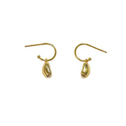 Gold teardrop earrings on a white background