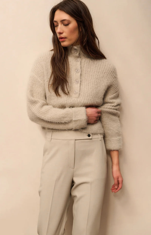 Fluffy cropped sweater with stand-up collar and buttons