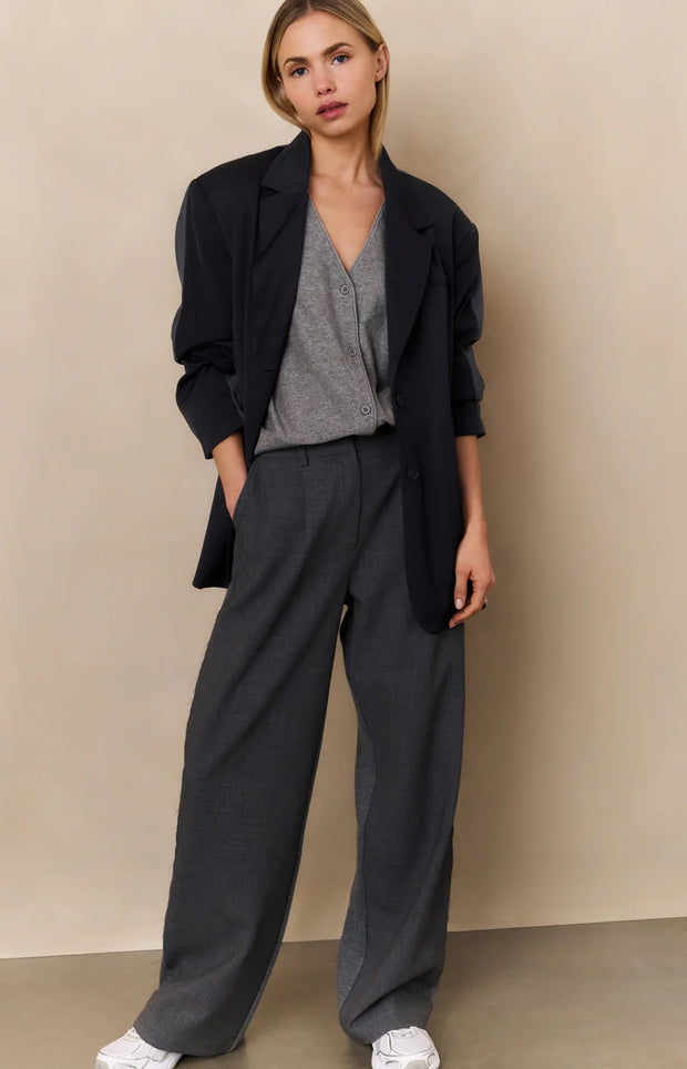 model wearing grey Knitted gilet with V-neck and asymmetric buttoning