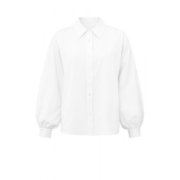 White Blouse crafted from refined cotton and styled with elegant balloon sleeves and buttons.