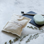 lifestyle shot of herbs bath mitt