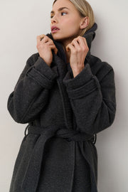 model wearing Long Bouclé Coat with belt and oversized fit 