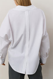 reverse detail of Poplin blouse with polo collar and V-neck