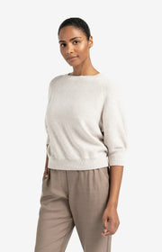 Woman wearing a beige sweater and pants on a white background, Raglan sweater with subtle balloon sleeves YAYA