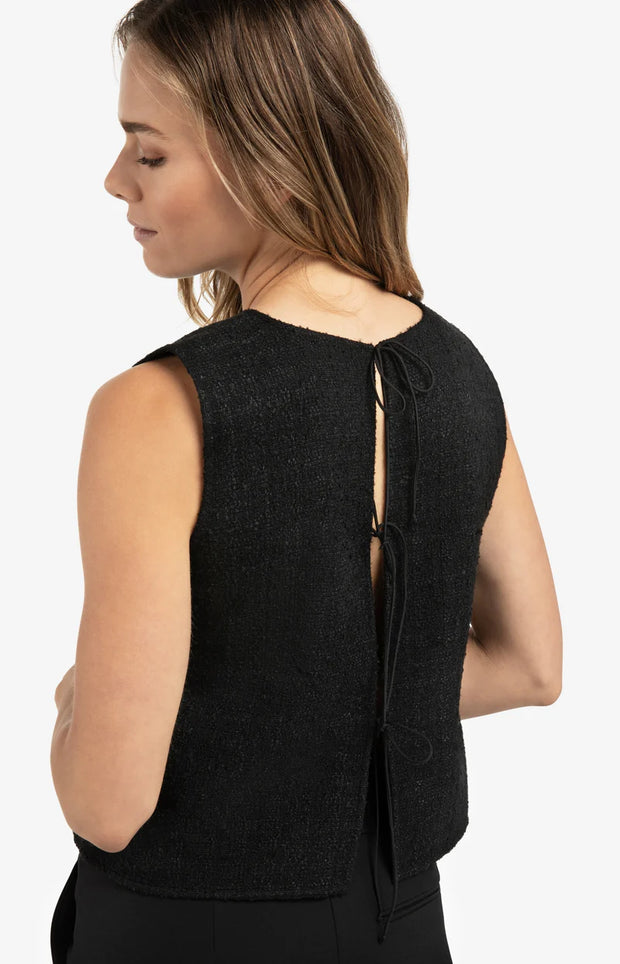 Black sleeveless top with tie-back design on a white background