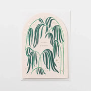 A6 card in an arch shape depicting palms and gold foiled stars From Victoria shop