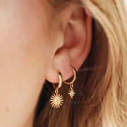 E084 Sunburst and Star Charm Huggie Hoop Earrings in Gold