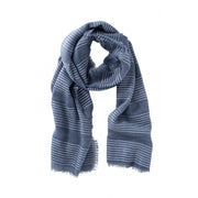 A versatile scarf styled with frayed edges, a stripe print and washing effect.