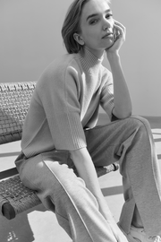 Soft sweater with high neck and three-quarter sleeves