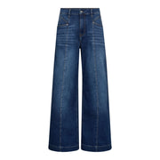 Blue wide-leg jeans on a white background, Co Couture