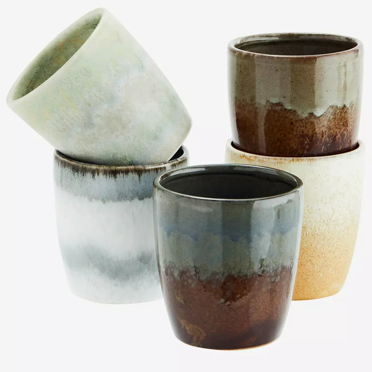 stoneware cups in various glazes