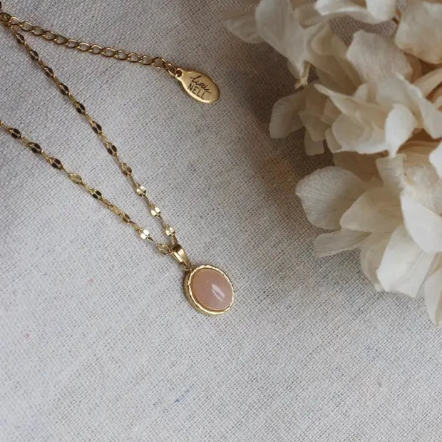 Gold chain necklace with rose quartz pendant