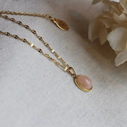 Rose Quartz Necklace, a delicate, timeless addition to any jewellery collection. Designed with a gold petal chain to catch the light.