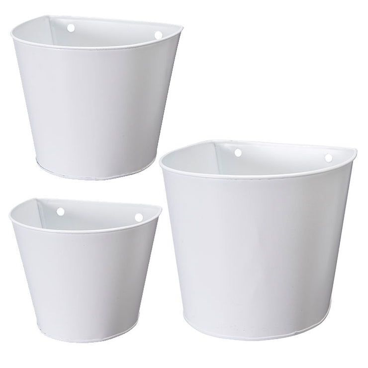 white metal hanging wall planters. various sizes available. lined with plastic.
