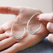 E052 Hammered Teardrop Hoop Earrings in Silver