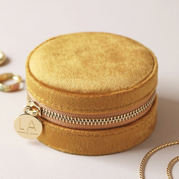 circular jewellery case in velvet mustard colour